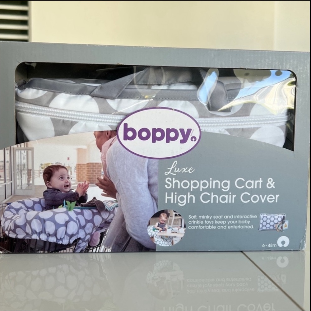 High chair and grocery shopping cart cover. BOPPY brand. Brand new in box